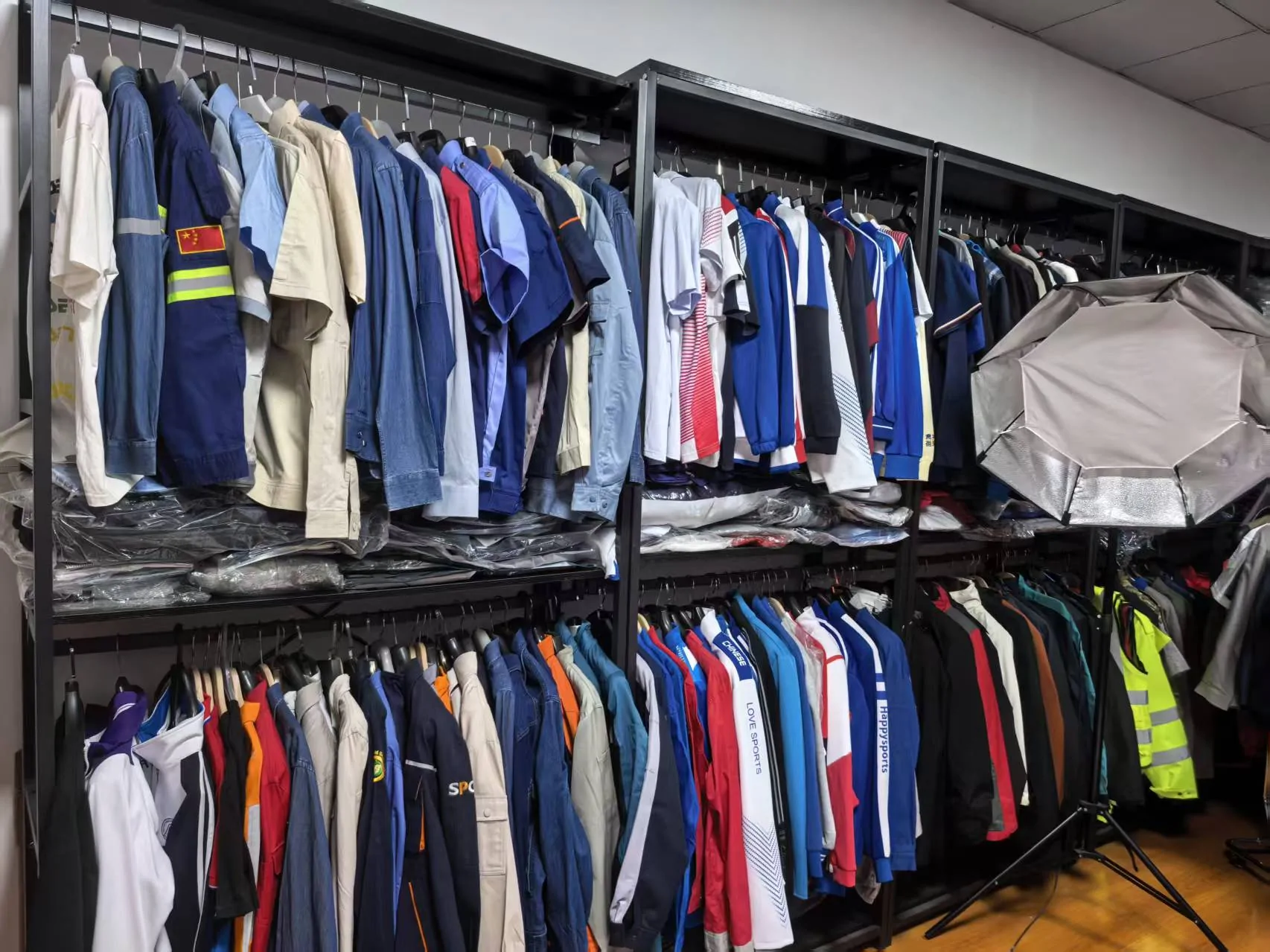 Wide range of custom apparel samples displayed in the LF showroom