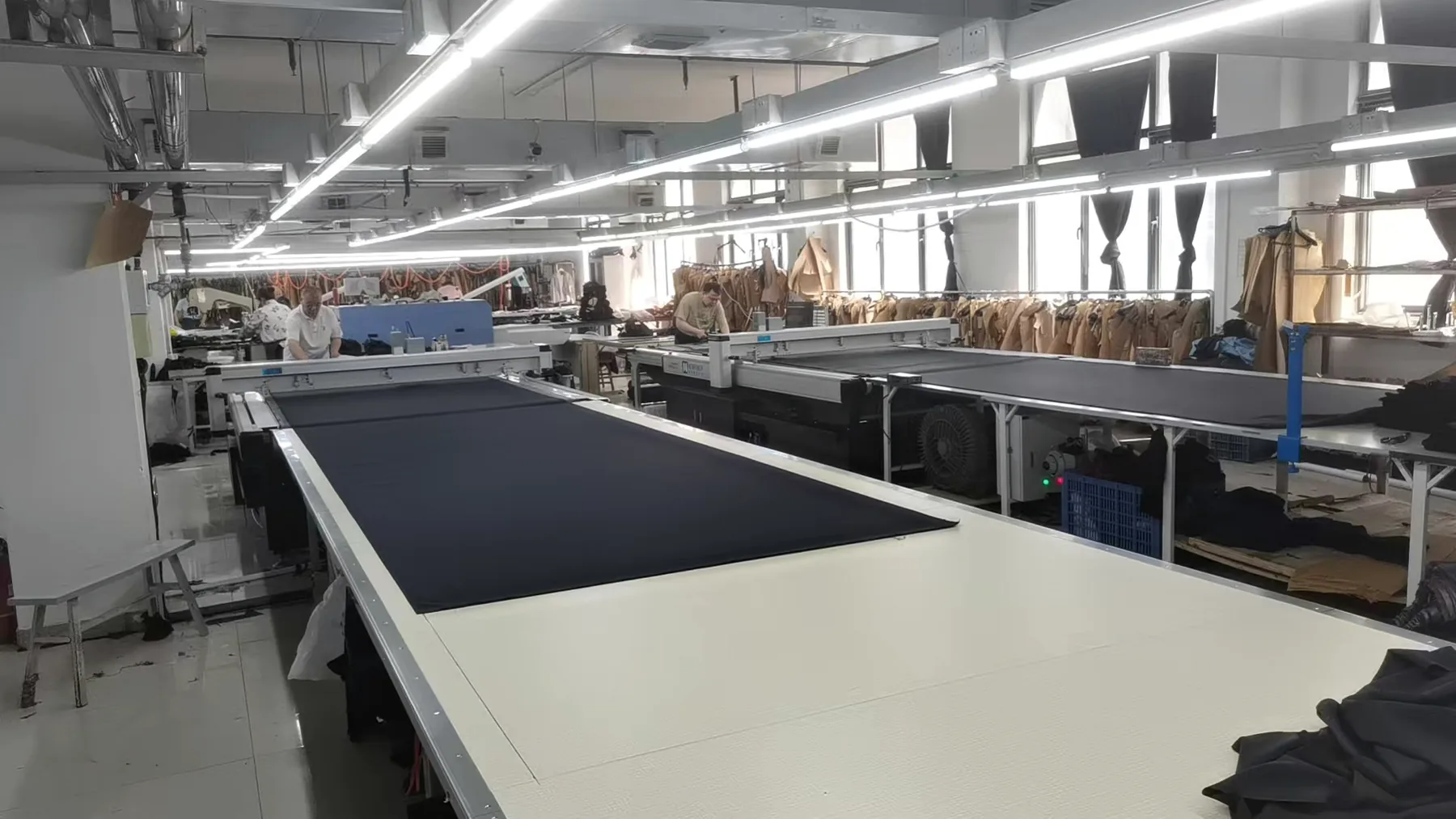 Garment fabric cutting and production preparation for custom workwear orders